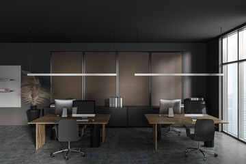 Grey office interior with pc computer on desk and drawer with panoramic window