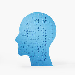 Blue man head made of puzzle pieces