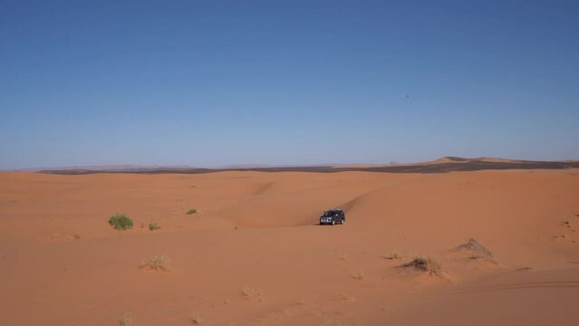 Sand Dunes Tour - 4x4 Vehicle Driving On Sand Dunes. - aerial