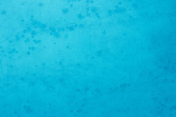 Obraz premium Blue light concrete texture for background in summer wallpaper. Cyan cement colour sand wall of tone vintage. Abstract teal dark color. 