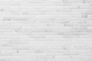 White grunge brick wall texture background for stone tile block painted in grey light color wallpaper modern interior and exterior design.
