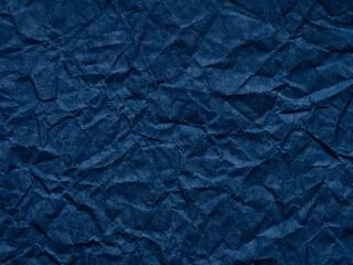 Dark navy blue crumpled paper texture. Blank page pattern for winter season Christmas festival card, new year designs decoration, background concepts, text, lettering, wall screen saver, 3d art work.