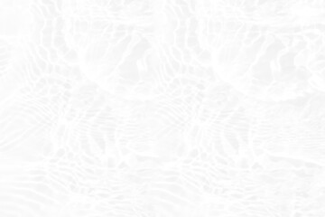 Defocus blurred transparent white colored clear calm water surface texture with splashes and bubbles. Trendy abstract nature background. Water waves in sunlight with copy space. White water shine
