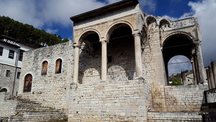 Berat is a city on the Osum River in central Albania. It is famous for the white Ottoman houses and for the castle of Berat, a huge complex on the hill where some citizens now reside. inside its walls
