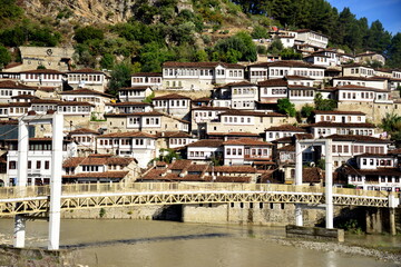 Obraz premium Berat is a city on the Osum River in central Albania. It is famous for the white Ottoman houses and for the castle of Berat, a huge complex on the hill where some citizens now reside. inside its walls