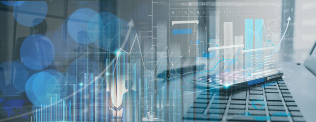 Office business workplace with laptop and smart phone and stylus showing virtual innovaton business management dashboard.