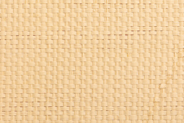 beige colored background with  woven structure