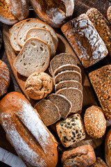 Assorted bakery products including loafs of bread and rolls