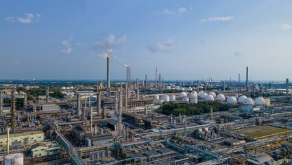 Aerial view of Oil and gas industry - refinery, Shot from drone of Oil refinery and Petrochemical plant at twilight, Rayong, Thailand
