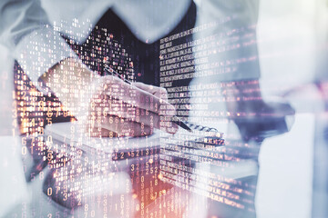 Creative code skull sketch and man hand writing in notepad on background, theft of personal data and malware concept. Multiexposure