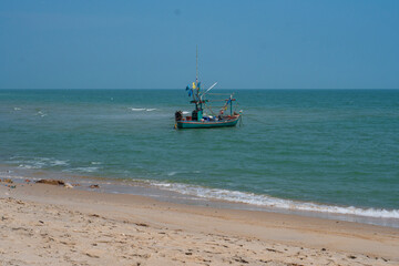 Obraz premium fishing boat on the beach
