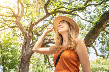Young travel woman enjoying vacation trip. Fun adventure travel. Wellness, freedom and nature