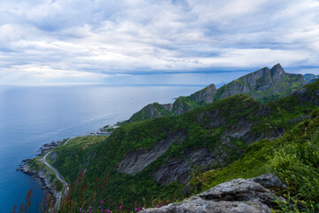 Fototapeta na wymiar Ocean view from famous Reinebringen hike in the mountains of Lofoten islands in Norway