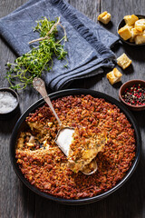 Tasty Bake with meat, mushrooms, cheese, onion