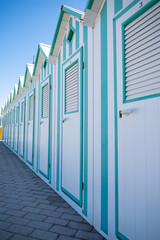 white beach huts