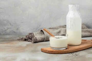 A bottle of milk and glass of yogurt, kefir, fermented milk, Probiotic cold fermented dairy drink. top view