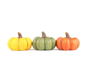 Pumpkins made out of clay isolated on white
