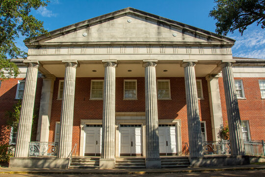 Natchez, USA &ndash; December 2, 2022 - Natchez City Auditorium with a broad, hexastyle pedimented Doric portico in On Top of the Hill Historic District of Natchez, Adams County, Mississippi