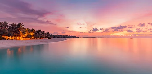 Photo sur Plexiglas Lavende Beautiful panoramic sunset tropical paradise beach. Tranquil summer vacation or holiday landscape. Exotic sunrise beach seaside palm trees silhouette sea bay view inspirational seascape and sky clouds