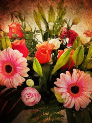 Beautiful flowers gift bouquet on an old paper textured background. Composition of live gerberas, lilies and roses
