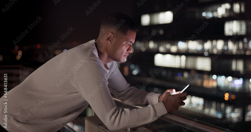 Poster business man, phone and night data while online on an urban building rooftop typing email, search or