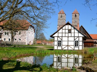 Fototapeta premium farmhouse and little pond at Kloster Veßra agricultural museum