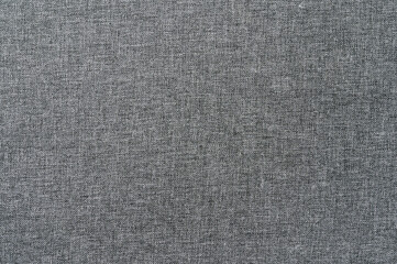 Fototapeta na wymiar Texture of gray fabric as background, close-up, top view