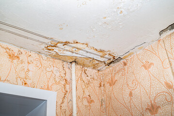 Damage ceiling from water pipelines leakage. Housing problem concep