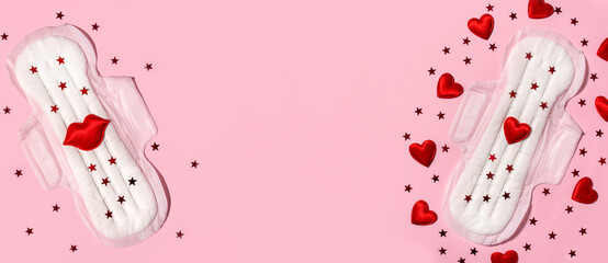 Sanitary pads in red sequins on a pink background. The concept of female menstruation. Feminine hygiene products. Banner. Copy space.