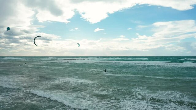 Kate surfing, in Puglia, rough sea 1