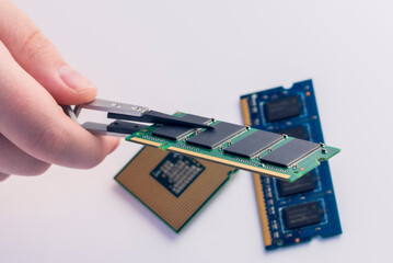 Technician fixing computer. Repair and upgrade concept of laptop. Workshop background