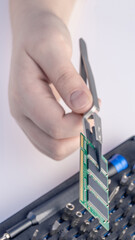 Technician fixing computer. Repair and upgrade concept of laptop. Workshop background