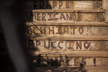 Name of coffee paint on the stair