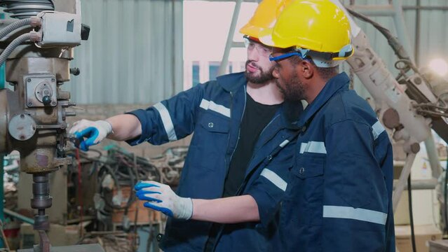 Engineer man training with foreman for apprentice using lathe, apprenticeship teaching with worker, technician and learning, inspector and labor, internship and workshop, industrial concept.