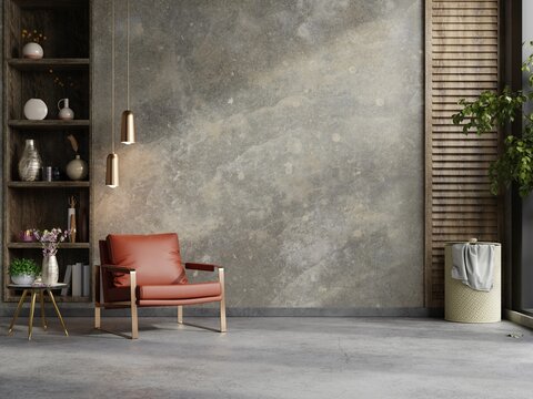 Style loft interior with leather armchair on dark cement wall.