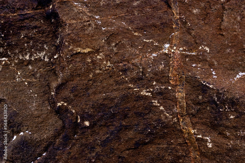Poster texture of natural stone with irregularities. background from a stone with a vignette. wall