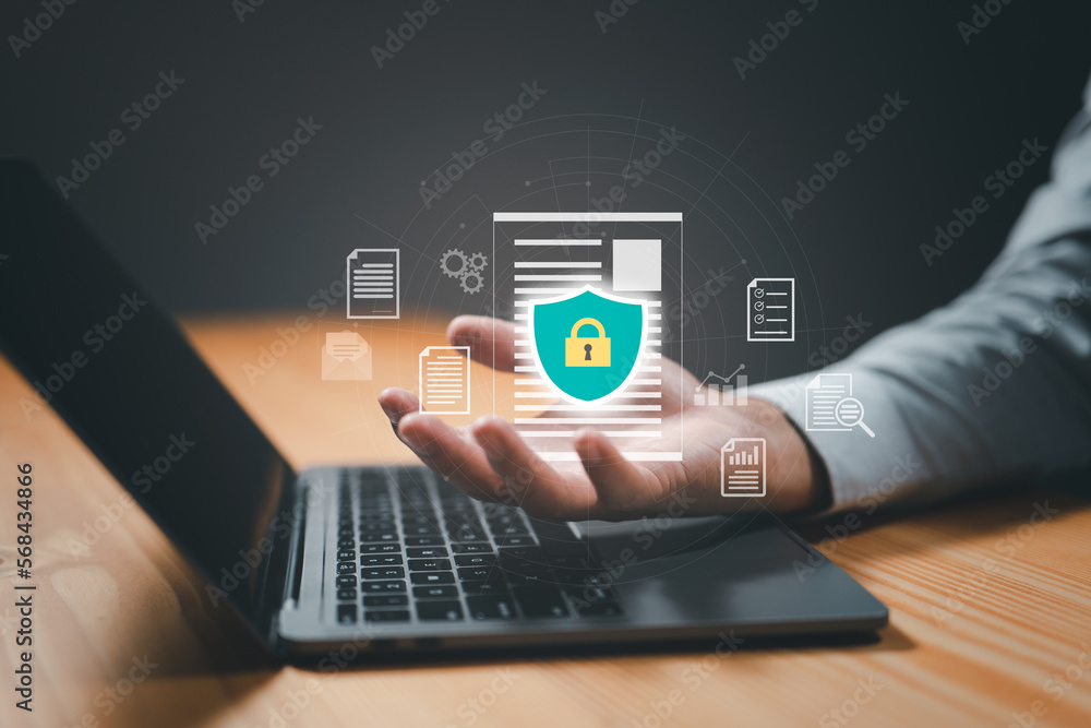 Aufkleber concept is data security access. Shield on a computer desktop or laptop protect sensitive data. Internet security.