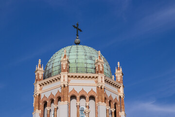cross on top of a church tower