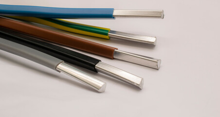 aluminum electrical cables, ends of wires, on a white background