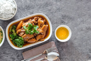 Top Table View of Stew pig's  feet, with Rice, copy Sapce for your Text.
