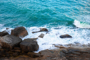 The sea wave beats on the rocks,top view. Sea rocky landscape