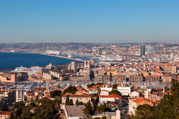 Fototapeta na wymiar Marseille, France - FEB 28, 2022: Aerial view of the city of Marseille on a sunny winter day