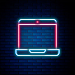 Glowing neon line Laptop icon isolated on brick wall background. Computer notebook with empty screen sign. Colorful outline concept. Vector