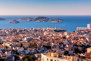 Marseille, France - FEB 28, 2022: Beautiful horizon view with golden sunlight from the coast of...