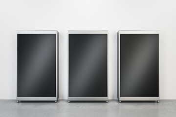 Three empty black banners on white concrete wall background. Mock up, 3D Rendering.