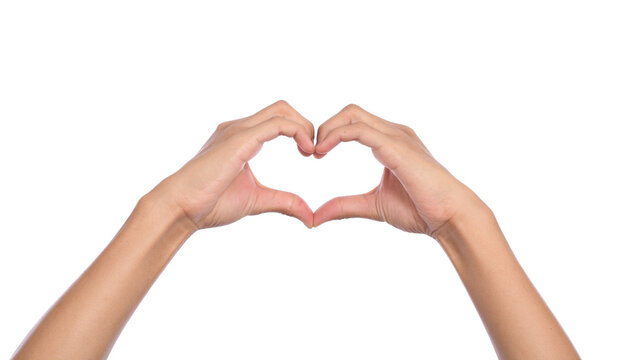 Woman hands making a heart shape on a white isolated background