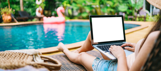 Vacation Woman working on her laptop in holiday  remote online working digital Freelance work...