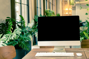 blank screen desktop computer in office room.