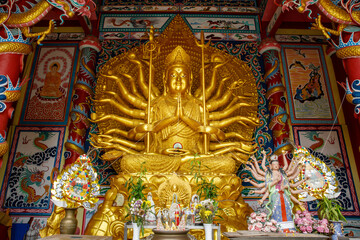 Wiset Chai Chan District Ang Thong Province, Thailand - August 20, 2022 : Statue of Goddess of Mercy with a Thousand Golden Hands at Wat Muang temple