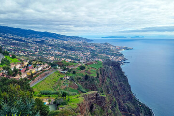 Fototapeta na wymiar The green island of Madeira from a height. Rest in the Atlantic Ocean.